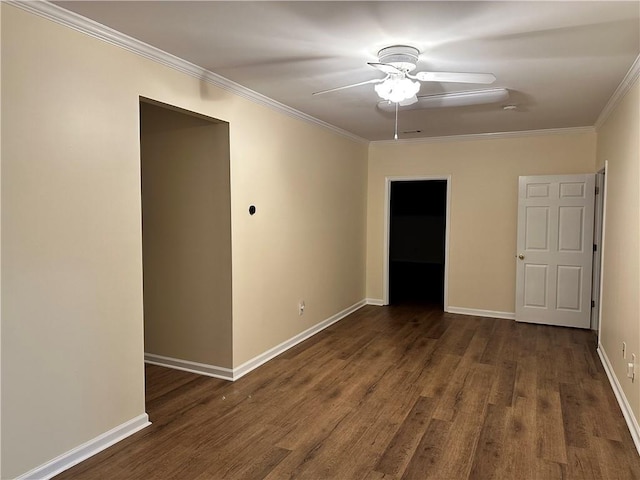 unfurnished room with dark wood-type flooring, ceiling fan, and ornamental molding