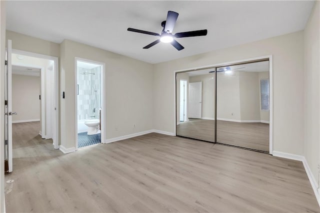 404 Hawkstone Way, Alpharetta, GA 30022 - unfurnished bedroom featuring light wood-style flooring, a closet, ceiling fan, and ensuite bathroom