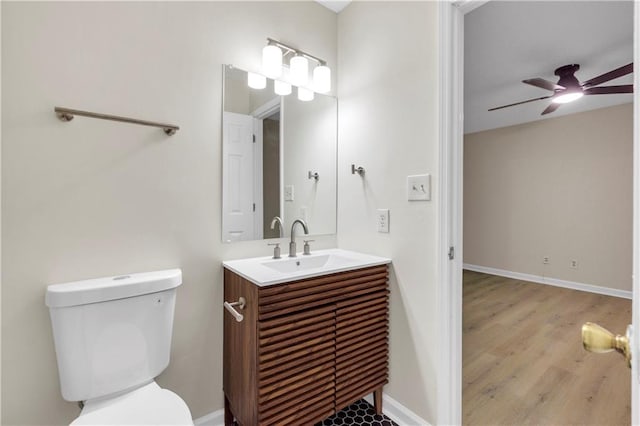 404 Hawkstone Way, Alpharetta, GA 30022 - bathroom featuring a ceiling fan, vanity, and wood finished floors