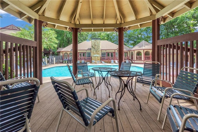 404 Hawkstone Way, Alpharetta, GA 30022 - wooden deck featuring a gazebo and a community pool