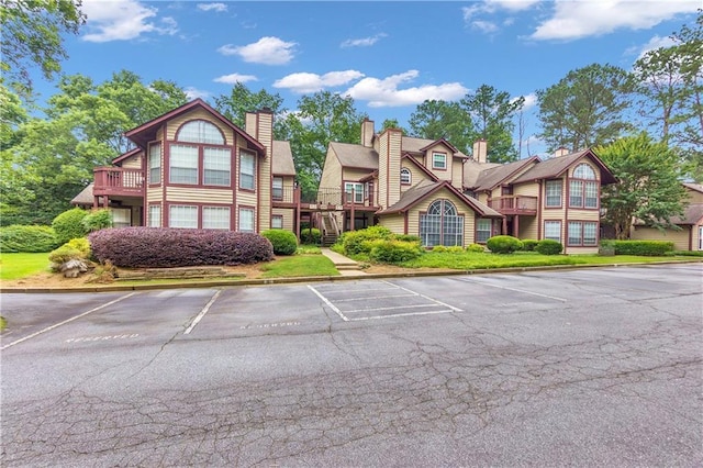404 Hawkstone Way, Alpharetta, GA 30022 - view of building exterior featuring uncovered parking