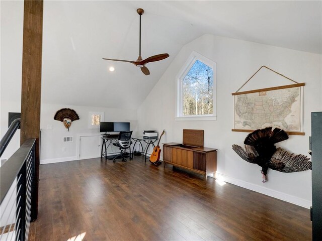 home office featuring lofted ceiling, ceiling fan, baseboards, and wood finished floors