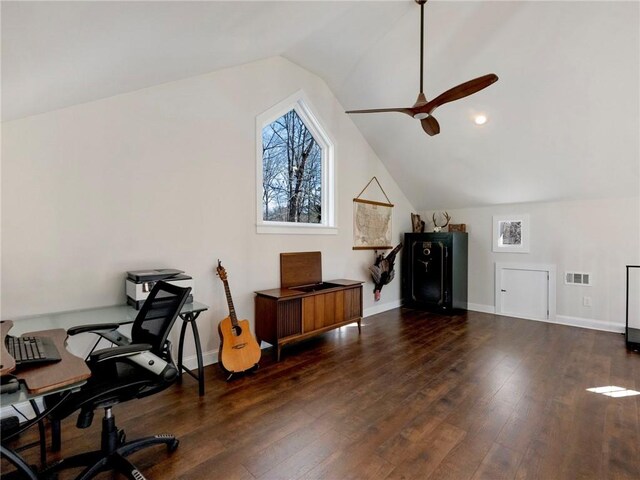 office space with vaulted ceiling, hardwood / wood-style floors, visible vents, and baseboards