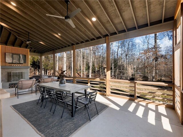 view of patio with ceiling fan and outdoor dining area