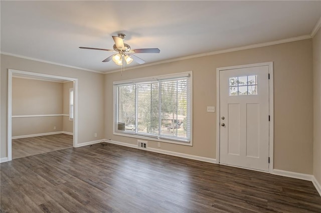 foyer entrance featuring crown molding, dark wood-type flooring, and ceiling fan