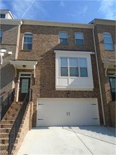 view of property with a garage