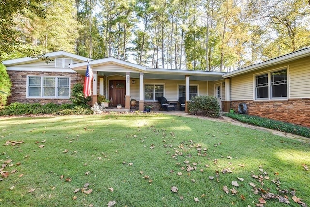 ranch-style home with a front yard