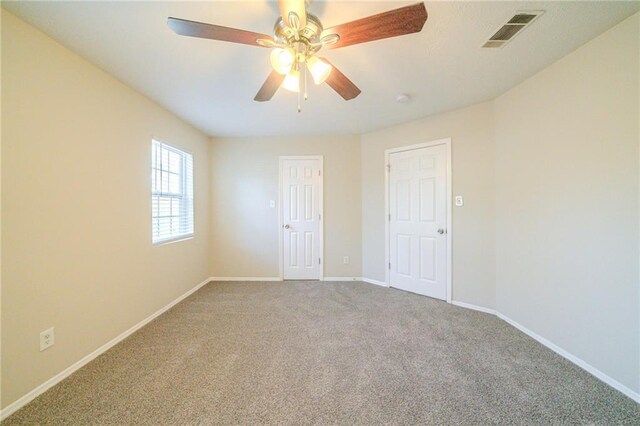 1129 Winston Dr, Decatur, GA 30032 - unfurnished room featuring ceiling fan and light colored carpet