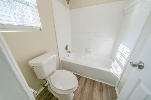 1129 Winston Dr, Decatur, GA 30032 - bathroom with toilet, tiled shower / bath, and wood-type flooring