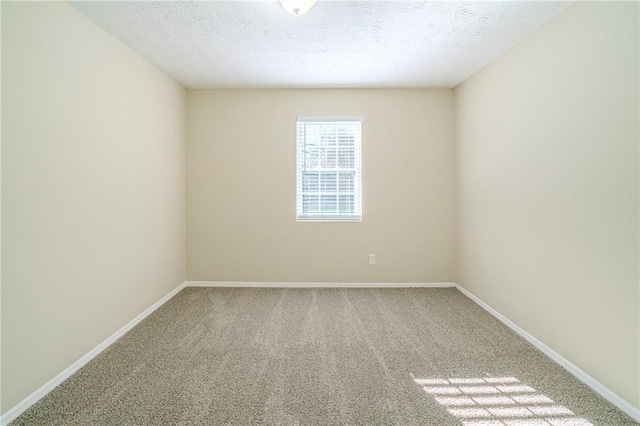1129 Winston Dr, Decatur, GA 30032 - carpeted empty room with a textured ceiling