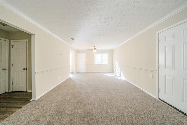 1129 Winston Dr, Decatur, GA 30032 - carpeted empty room featuring ceiling fan, a textured ceiling, and ornamental molding