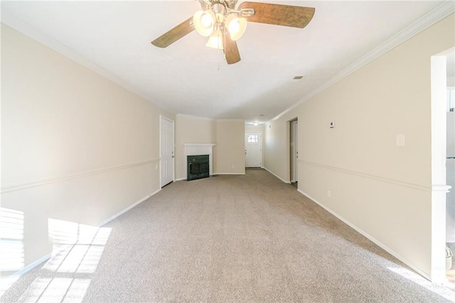 1129 Winston Dr, Decatur, GA 30032 - unfurnished living room featuring ceiling fan, crown molding, and light carpet