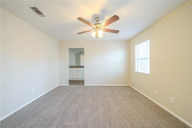 1129 Winston Dr, Decatur, GA 30032 - carpeted spare room featuring ceiling fan