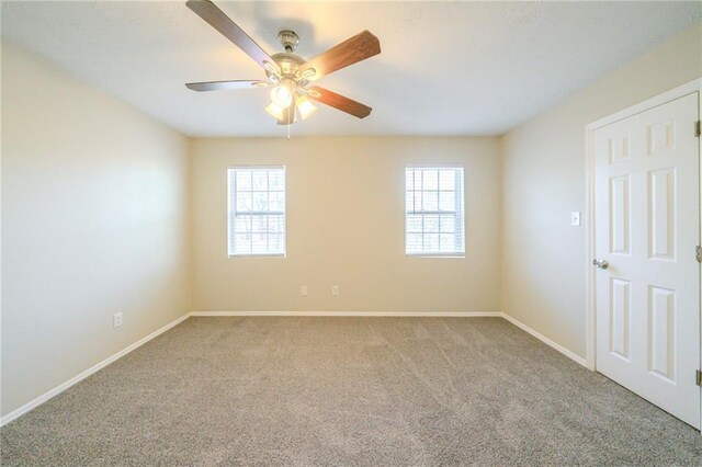 1129 Winston Dr, Decatur, GA 30032 - carpeted empty room with ceiling fan and a healthy amount of sunlight