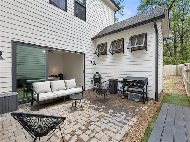 view of patio / terrace featuring area for grilling and outdoor lounge area