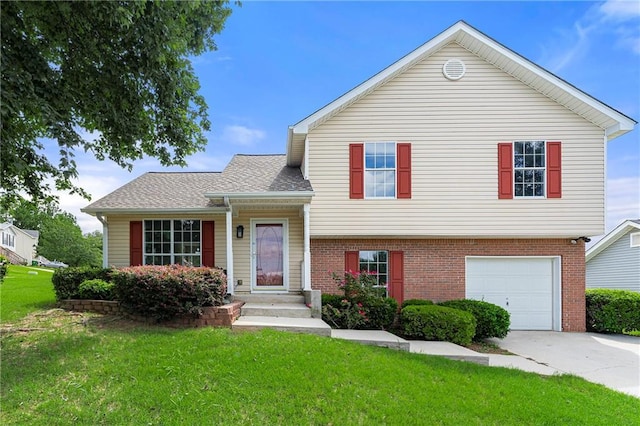 split level home with a garage and a front lawn