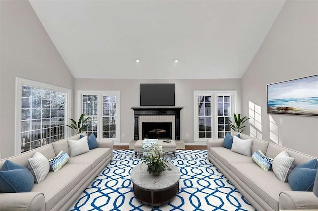 3017 Lana Ln, Marietta, GA 30066 - living room with high vaulted ceiling, a brick fireplace, and light wood-style flooring