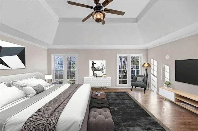 3017 Lana Ln, Marietta, GA 30066 - bedroom with a tray ceiling, wood finished floors, ornamental molding, and ceiling fan