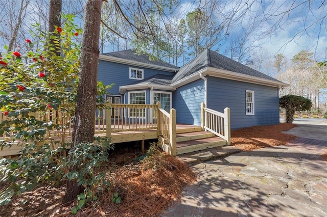 3017 Lana Ln, Marietta, GA 30066 - back of property with a deck and roof with shingles