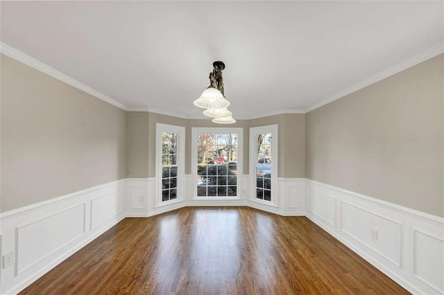 3017 Lana Ln, Marietta, GA 30066 - unfurnished room featuring a chandelier, dark wood finished floors, a wainscoted wall, a decorative wall, and ornamental molding