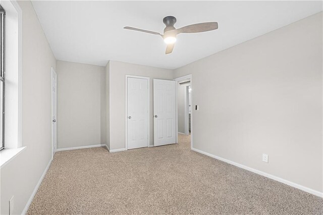 stairs featuring a high ceiling and carpet flooring