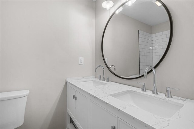 full bathroom with shower / bath combination, vanity, tile patterned floors, and toilet