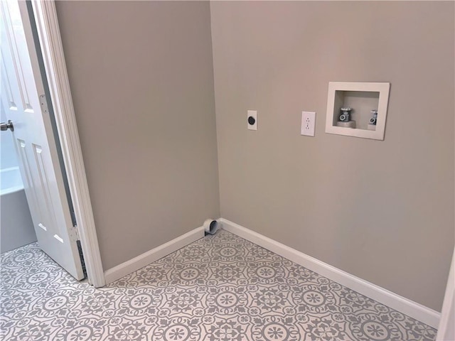 washroom with hookup for a washing machine, hookup for an electric dryer, and light tile patterned floors