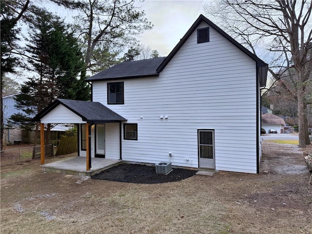 rear view of property featuring a patio area