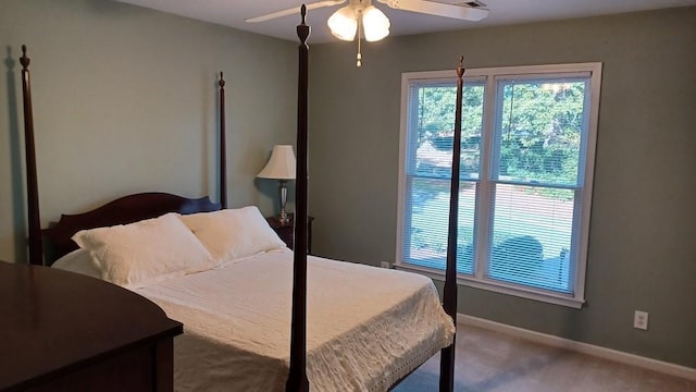 bedroom featuring ceiling fan and carpet floors