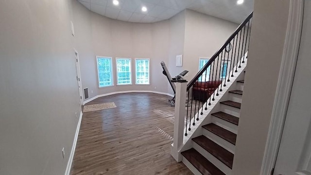 foyer entrance with hardwood / wood-style floors