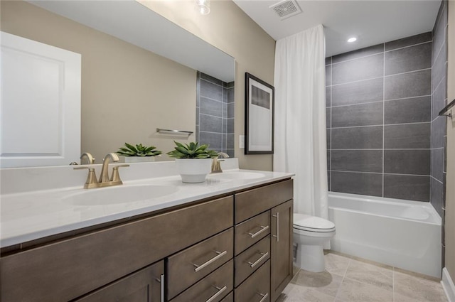 full bathroom with toilet, tile patterned flooring, shower / tub combo, and vanity