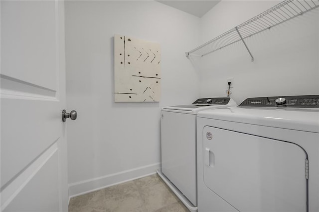 laundry area featuring washer and clothes dryer