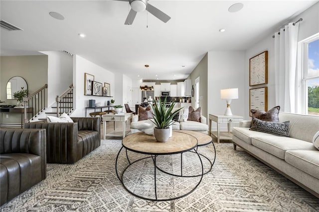 living room featuring ceiling fan