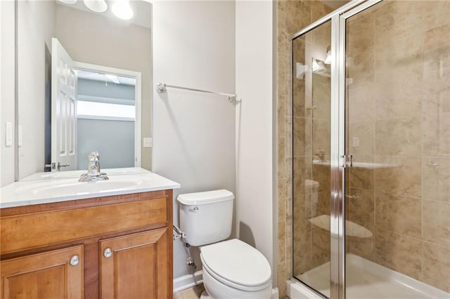 2252 Limehurst Dr NE, Atlanta, GA 30319 - bathroom featuring a stall shower, vanity, and toilet
