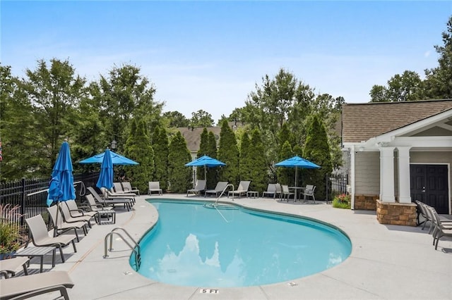 2252 Limehurst Dr NE, Atlanta, GA 30319 - community pool featuring a patio and fence