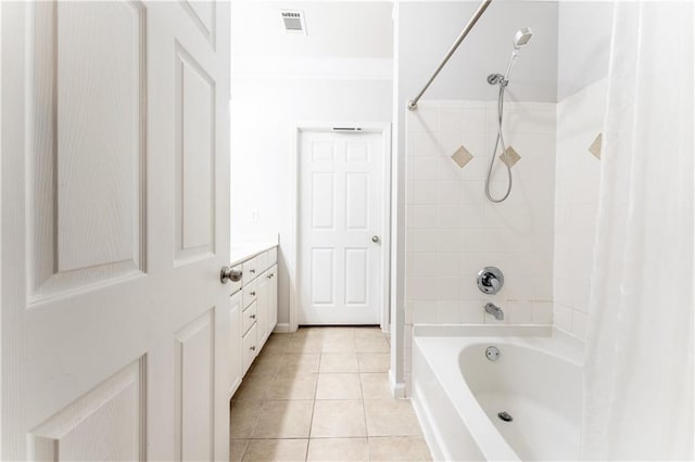 bathroom with visible vents, ornamental molding, tile patterned floors, vanity, and shower / bathtub combination with curtain