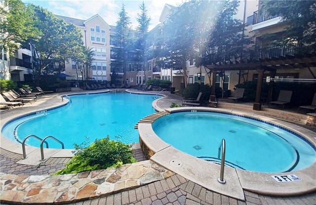 view of pool featuring a patio