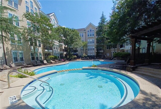 view of pool with a patio