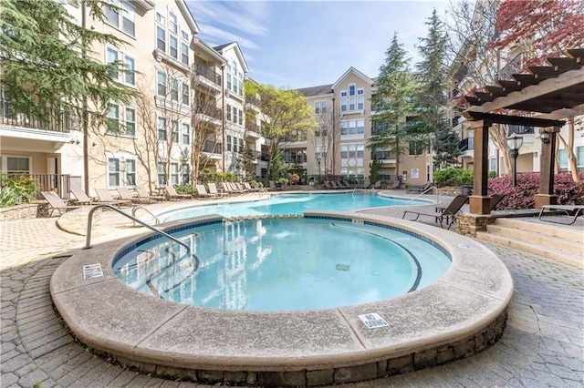 pool with a patio area
