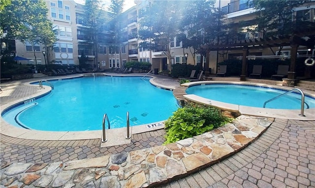 community pool featuring a patio