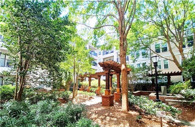 view of home's community with a pergola