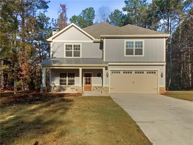 craftsman-style home with a porch, a garage, and a front lawn