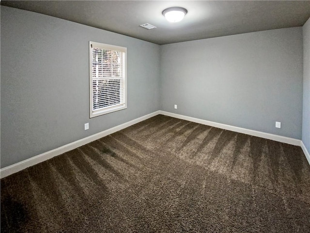 spare room with carpet floors