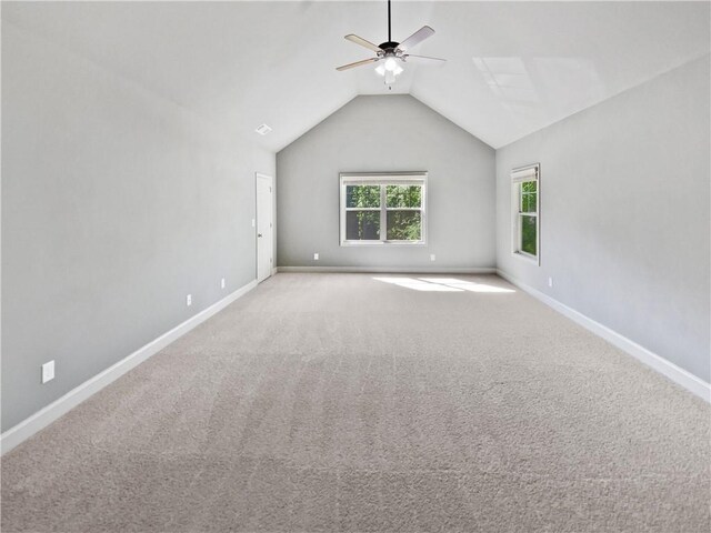 60 Hammock Dr, Covington, GA 30016 - spare room with ceiling fan, lofted ceiling, carpet floors, and baseboards