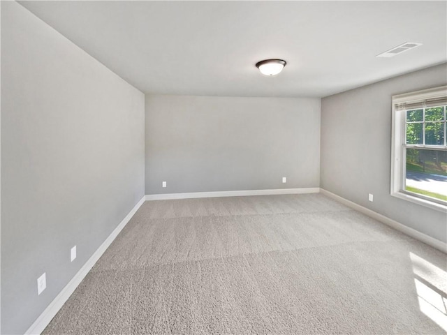 60 Hammock Dr, Covington, GA 30016 - empty room featuring light carpet and baseboards