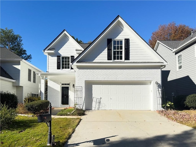 front of property with a garage