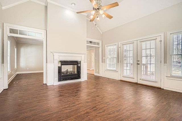 100 Hamilton Glen Ct, Fayetteville, GA 30215 - unfurnished living room with ceiling fan, high vaulted ceiling, a multi sided fireplace, french doors, and dark wood finished floors