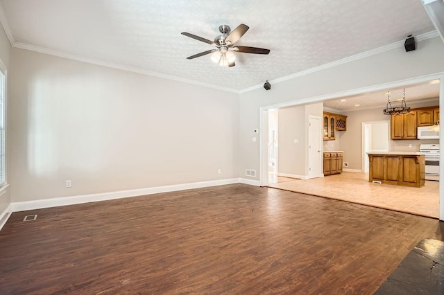 100 Hamilton Glen Ct, Fayetteville, GA 30215 - unfurnished living room with wood finished floors, a ceiling fan, and ornamental molding
