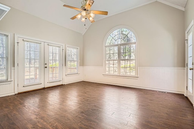 100 Hamilton Glen Ct, Fayetteville, GA 30215 - empty room with vaulted ceiling, a wainscoted wall, french doors, a ceiling fan, and dark wood-style flooring