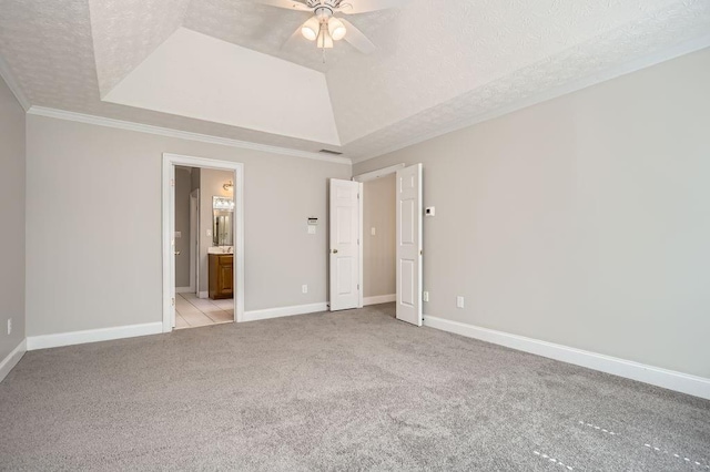 100 Hamilton Glen Ct, Fayetteville, GA 30215 - unfurnished bedroom featuring a raised ceiling, light carpet, crown molding, a textured ceiling, and ensuite bathroom